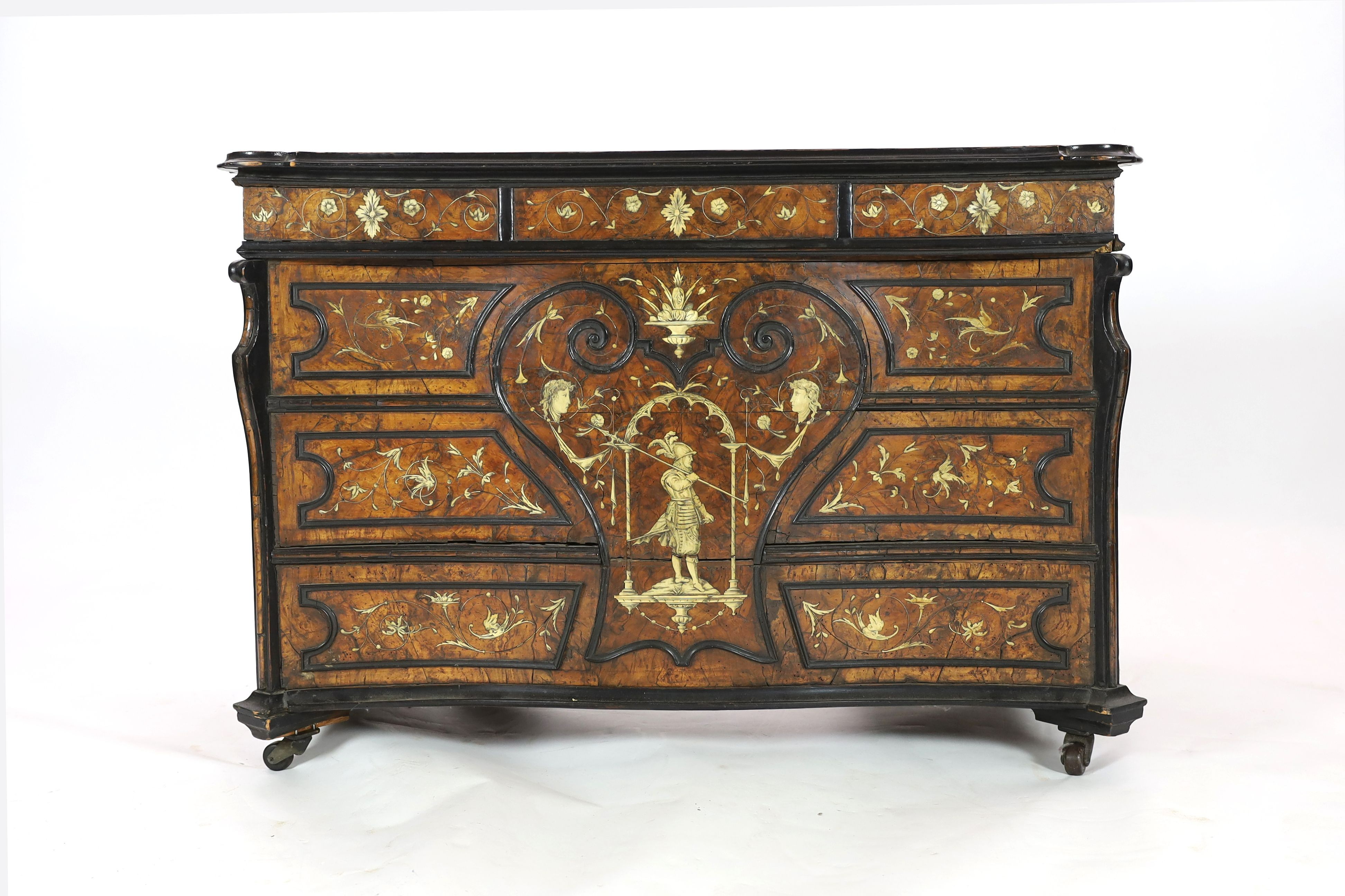 NOT TO BE CLEARED - SEE DG/AM An important 18th century Lombardy ebony banded walnut and ivory inlaid twin pedestal desk, the top and sides inlaid with a scenes from Homer’s Iliad, after original drawings by John Flaxman